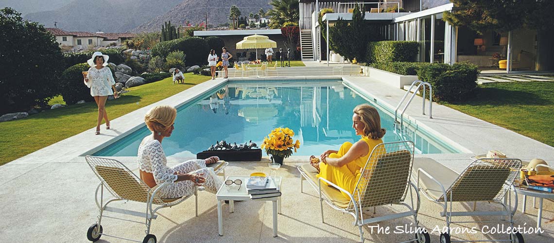 Note this image is available as an Open Edition only. Limited Edition is Sold Out. Please contact us directly to discuss. A desert house in Palm Springs designed by Richard Neutra for Edgar J. Kaufmann. Lita Baron approaches on the right Nelda Linsk, wife of art dealer Joseph Linsk who is talking to a friend, Helen Dzo Dzo. Original Artwork: A Wonderful Time – Slim Aarons (Photo by Slim Aarons)