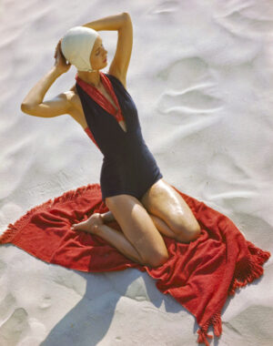 Girl On A Red Beach Towel